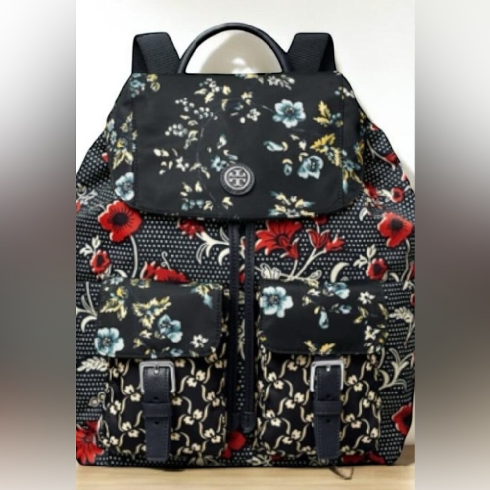 Tori Burch Virginia Mixed Print Flap Backpack.